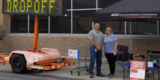 Thanks to Team MDOT SHA for participating in Operation Orange, collecting donations for the Maryland Food Bank. In this photo District Engineer Tony Crawford and District Community Liaison Shelley Miller collect food donations at a local shopping center.